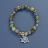 Bracelet vert en grenat grossulaire — perle de 8 mm de diamètre, longueur environ 18 cm, élastique avec pendentif en forme de spirale