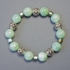 Bracelet jadéite – billes lisses, diamètre 12 mm ±, cube d'hématite, diamètre 5×5 mm ±, longueur 18 cm, élastique