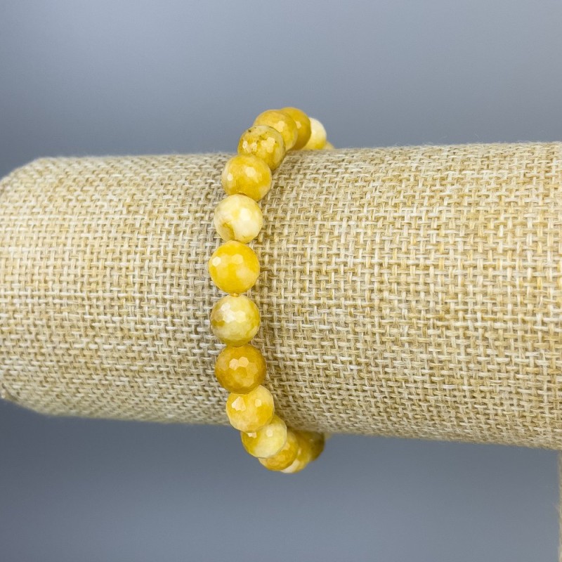 Bracelet en jadéite, perles facettées de 8 mm ±, longueur 18 cm ±, élastique