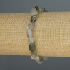 Bracelet quartz rutile à aiguilles, perles taillées en galets, diamètre 8-10×7 mm ±, longueur 18 cm ± élastique