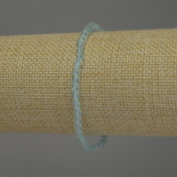 Bracelet en topaze naturelle, disque facetté de 4 mm de diamètre, longueur environ 18 cm, élastique
