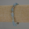 Bracelet en calcite bleue, perles cylindriques diamètre 10×6 mm et rocaille 3 mm +/-, longueur 18 cm +/- élastique