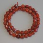 Perles de cornaline facettées 8x7 mm ± sur fil, longueur 37 cm+