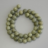 Perles de serpentine pressées, sphères lisses 10 mm ±, longueur 39 cm ± sur fil