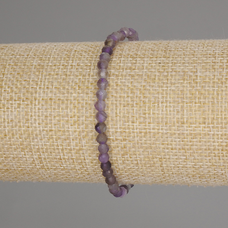 Bracelet en améthyste facetée, boules de 4 mm, longueur environ 18 cm, élastique