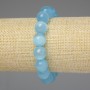 Bracelet œil-de-chat bleu clair, boules lisses 12 mm ±, longueur 18 cm ±, élastique