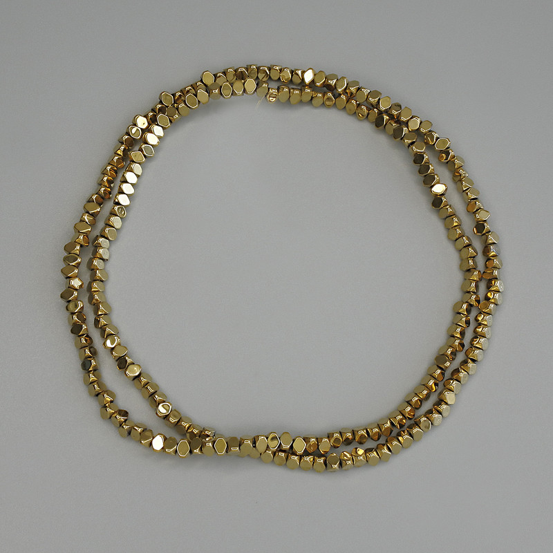 Perles d'hématite dorées facettées 3×2 mm ± sur fil, longueur 40 cm+