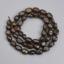 Perles de bronzite facettées 6-11×5, 5-7, 5 mm ±, longueur 40 cm ± sur fil