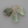 Pendentif fluorite, pierre brute en tressage doré 44 × 20 mm ± assortiment de tailles
