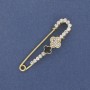 Broche-épingle avec trèfle et strass blancs, 58×15 mm ± métal doré