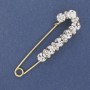 Broche-épingle avec strass blancs, métal doré, 79 × 20 mm ±