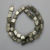 Perles de pyrite — pierre naturelle, galets roulés bruts, diamètre environ 4–12×7–11 mm (+/-), longueur 38 cm (+/-) sur fil