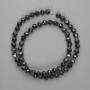 Perles d'hématite facettées, 6 mm ±, longueur environ 39 cm, sur fil