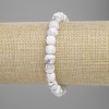 Bracelet en howlite taillé en cubes, diamètre 7 mm ±, longueur 18 cm ±, élastique