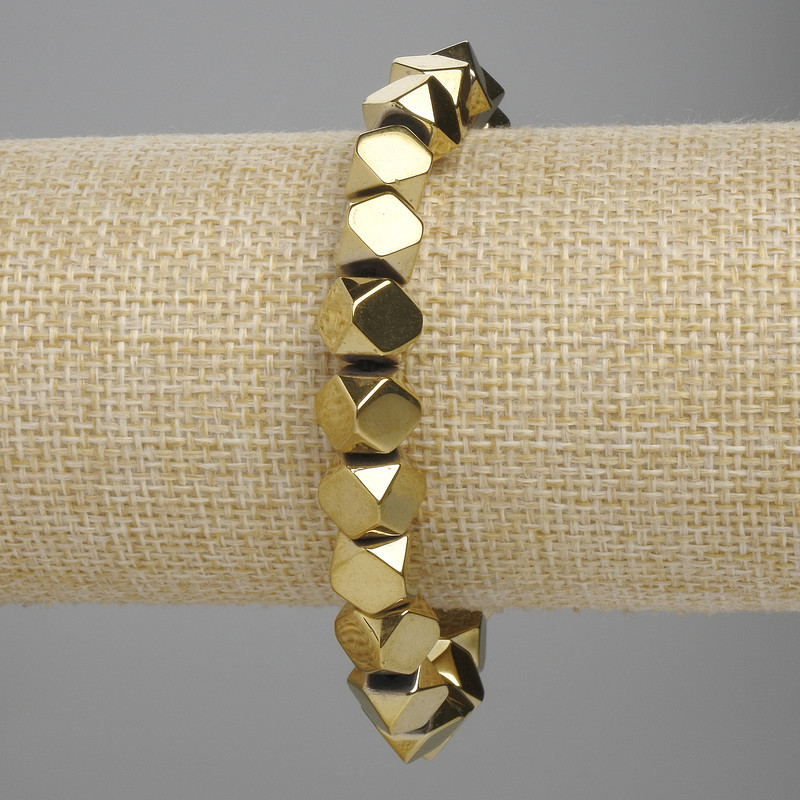 Bracelet en hématite facettée 8×8 mm ± couleur dorée, longueur 18 cm ± élastique