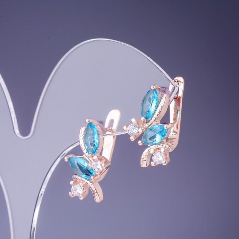 Boucles d'oreilles à cristaux bleu clair 19×12 mm, métal doré