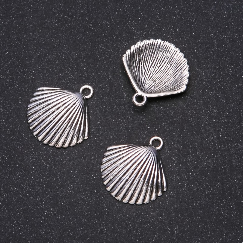 Pendentif coquille 24×25 mm, conditionnement 20 g ± 8 pièces
