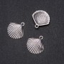 Pendentif coquille 24×25 mm, conditionnement 20 g ± 8 pièces