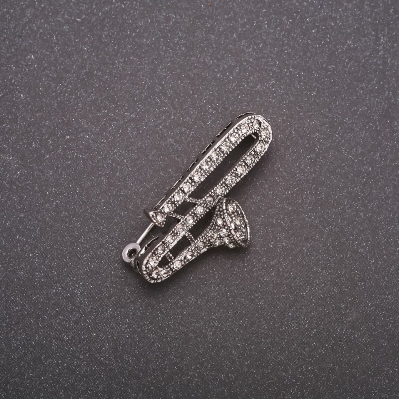 Broche Flûte en strass, métal gris, 38 × 19 mm