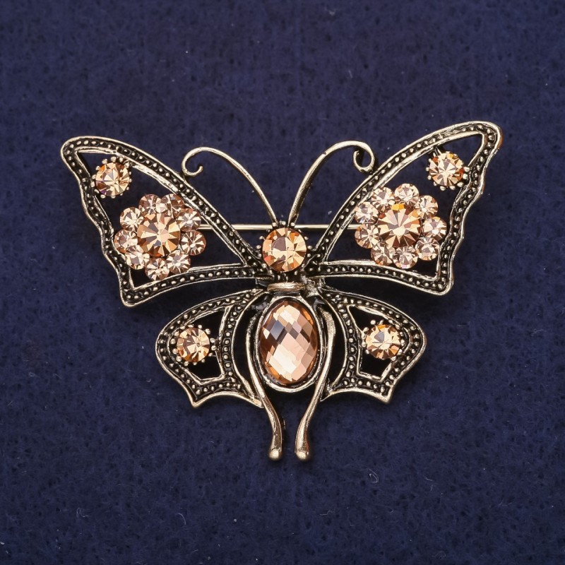Broche Papillon avec strass couleur champagne 54 × 40 mm