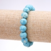 Bracelet « Variscite » (pressé) perles bleues lisses, diamètre 10 mm, longueur 18 cm sur élastique