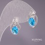 Boucles d'oreilles Xuping avec pierre bleu clair, 18 × 10 mm, rhodié