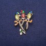 Broche «Perroquets avec cabochon œil-de-chat», métal doré 30 × 39 mm