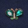 Broche papillon avec cristaux verts et blancs, métal doré 23×34 mm
