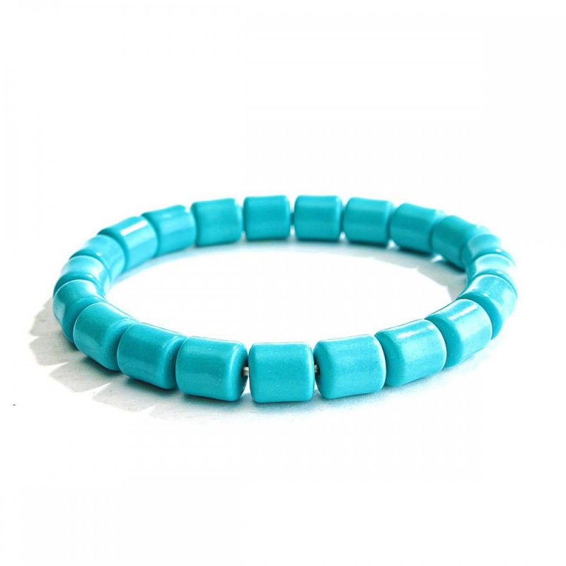 Bracelet élastique en turquoise bleu clair — pierres cylindriques 8×5×9 mm (+-)