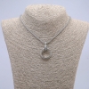 Pendentif-anneau 24×5 mm sur chaîne, longueur d'environ 70 cm, métal argenté