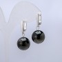 Boucles d'oreilles en obsidienne argentée, diamètre 14 mm ±, longueur 32 mm ±