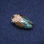 Broche en forme d'insecte Cigale avec émail et strass, métal doré, 19×35 mm