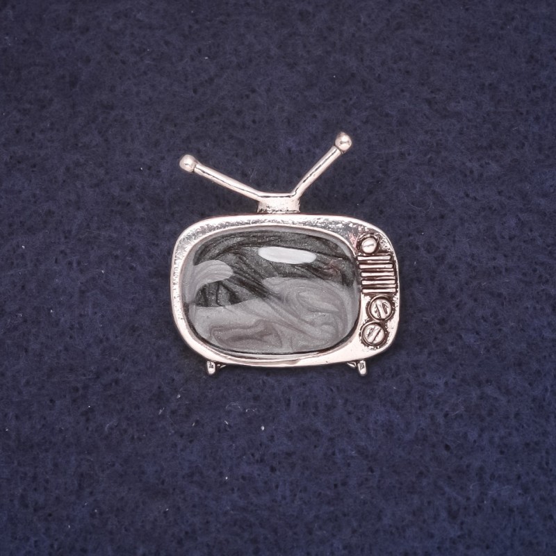 Broche Téléviseur 25×28 mm émail noir sur métal argenté