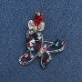 Broche papillon argenté en métal et strass 50 mm +