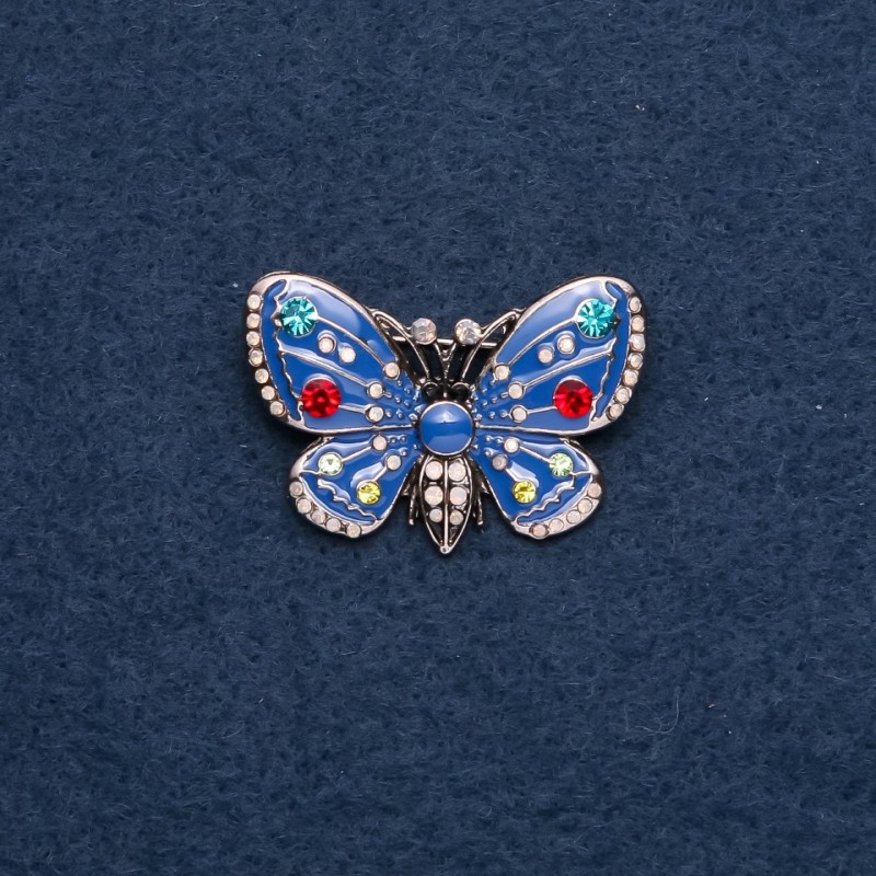 Broche «Papillon» émail bleu 25×38 mm couleur métal doré