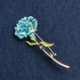 Broche Fleur giroflée émaillée bleu clair, métal doré 59×24 mm