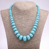 Collier «Turquoise» en perles disque à tailles croissantes, diamètre 8-20 mm (+/-), longueur 48 cm