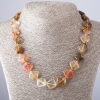 Collier en calcédoine, forme de losanges, longueur 47 cm, diamètre 14 × 14 mm